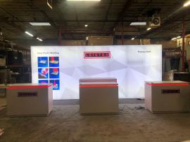 RENTAL: RE-2117 Lightbox Design with (3) RE-1576 White Laminated Reception Counters, RE-1578 White Laminated Genius Bar, SEG Fabric Graphics, and Vinyl Applied Graphics
